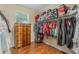 Large walk-in closet with ample hanging space and shelving at 349 Morning View Dr, Winter Garden, FL 34787