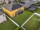 Aerial view of house, solar panels and backyard at 349 Morning View Dr, Winter Garden, FL 34787