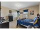 Bedroom with double bed, dresser, and window at 349 Morning View Dr, Winter Garden, FL 34787