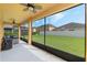 Relaxing screened porch overlooking backyard at 349 Morning View Dr, Winter Garden, FL 34787