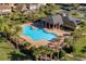 Resort-style pool with adjacent clubhouse at 349 Morning View Dr, Winter Garden, FL 34787