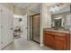 Bathroom with shower, vanity, and view into bedroom at 349 Morning View Dr, Winter Garden, FL 34787