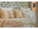 Main bedroom featuring a plush bed with a neutral-toned comforter and pillows at 349 Morning View Dr, Winter Garden, FL 34787