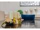 A centerpiece with candles and flowers sits on a dark wood dining table at 349 Morning View Dr, Winter Garden, FL 34787