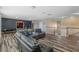 Game room with sectional sofa, game table, and arcade game at 349 Morning View Dr, Winter Garden, FL 34787