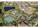 Aerial view of community amenities including pool, tennis courts, and playground at 349 Morning View Dr, Winter Garden, FL 34787