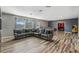 Spacious game room with sectional sofa and wood-look flooring at 349 Morning View Dr, Winter Garden, FL 34787