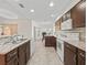Spacious kitchen with granite countertops and modern appliances at 32857 Timberwood Dr, Leesburg, FL 34748