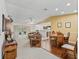 Spacious living room with hardwood floors, open floor plan, and comfortable seating at 32857 Timberwood Dr, Leesburg, FL 34748