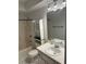 Bathroom with tub, shower, toilet and vanity at 192 Villa City Rd, Groveland, FL 34736