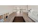 Open loft area with a view of the lower level at 16820 Bolsena Dr, Bella Collina, FL 34756