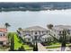 Stunning lakefront property with spacious yard and modern design at 16820 Bolsena Dr, Bella Collina, FL 34756