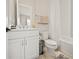 Clean bathroom with white vanity, toilet and bathtub at 16820 Bolsena Dr, Bella Collina, FL 34756
