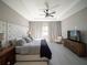 Spacious bedroom with a large bed and water view at 16820 Bolsena Dr, Bella Collina, FL 34756