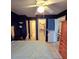 Bedroom with access to bathroom and closet at 6116 Curry Ford Rd # 229, Orlando, FL 32822