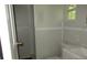 Simple, updated bathroom with white vanity and fixtures at 214 W Dade Ave, Bushnell, FL 33513