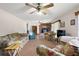 Bright living room showcasing a fireplace and comfortable seating at 5011 Griffin View Dr, Lady Lake, FL 32159