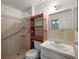 Bathroom with shower, toilet and a vanity with double sinks at 5011 Griffin View Dr, Lady Lake, FL 32159