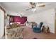 Living room with tile floors and multiple seating areas at 5011 Griffin View Dr, Lady Lake, FL 32159