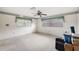 Spacious bedroom with wall-to-wall carpeting and ample natural light at 5011 Griffin View Dr, Lady Lake, FL 32159