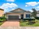 Single-Gathering home with a two-car garage at 1256 Stratton Ave, Groveland, FL 34736