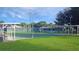 Community shuffleboard courts with covered seating areas at 4809 Saint Andrews Arc, Leesburg, FL 34748