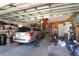 Spacious garage with ample storage space and room for a vehicle at 4809 Saint Andrews Arc, Leesburg, FL 34748