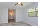 Bright bedroom with hardwood floors and en-suite bathroom at 6607 Kreidt Dr, Orlando, FL 32818