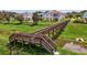 Wooden boardwalk with steps leading down to the water at 1180 Dora Parc Ln, Mount Dora, FL 32757