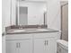 Double vanity bathroom with modern finishes at 1180 Dora Parc Ln, Mount Dora, FL 32757
