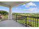 Balcony overlooking a scenic waterway and lush landscape at 1180 Dora Parc Ln, Mount Dora, FL 32757