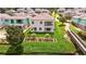 Aerial view of a house with landscaped yard near a boardwalk at 1180 Dora Parc Ln, Mount Dora, FL 32757