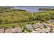 Waterfront community with homes near a tranquil waterway at 1180 Dora Parc Ln, Mount Dora, FL 32757