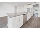 Modern kitchen island with stainless steel sink and dishwasher at 1180 Dora Parc Ln, Mount Dora, FL 32757