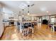 Open concept kitchen with island, stainless steel appliances, and hardwood floors at 1559 Lakeshore Dr, Eustis, FL 32726