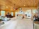 Relaxing sunroom with wood ceiling, tile floors, and water views at 1559 Lakeshore Dr, Eustis, FL 32726