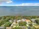 Lakefront home with a large yard and stunning lake views at 1559 Lakeshore Dr, Eustis, FL 32726