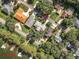 Aerial view highlighting lakefront location and neighborhood at 1559 Lakeshore Dr, Eustis, FL 32726