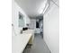 Bright laundry room with washer, dryer, and workspace at 1559 Lakeshore Dr, Eustis, FL 32726
