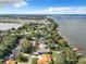 Aerial view of property with lake access and neighborhood context at 1559 Lakeshore Dr, Eustis, FL 32726