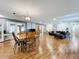Spacious dining area with hardwood floors and adjacent Gathering room at 1559 Lakeshore Dr, Eustis, FL 32726