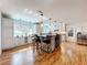 Spacious kitchen featuring a large island, granite countertops, and stainless steel appliances at 1559 Lakeshore Dr, Eustis, FL 32726