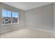 Spacious bedroom with neutral decor and window at 3018 Mirage Pl, St Cloud, FL 34771
