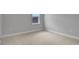 Bright bedroom featuring neutral walls and carpet at 3018 Mirage Pl, St Cloud, FL 34771