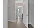 Bright hallway with access to closets and other rooms at 3018 Mirage Pl, St Cloud, FL 34771