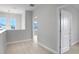 Upstairs hallway with neutral walls and carpet at 3018 Mirage Pl, St Cloud, FL 34771