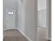 Clean entryway with white door and grey walls at 3018 Mirage Pl, St Cloud, FL 34771