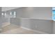 Upstairs hallway with neutral walls and carpet at 3018 Mirage Pl, St Cloud, FL 34771