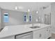 Modern kitchen island with white quartz countertop at 3018 Mirage Pl, St Cloud, FL 34771