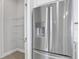 Stainless steel refrigerator in kitchen at 3018 Mirage Pl, St Cloud, FL 34771
